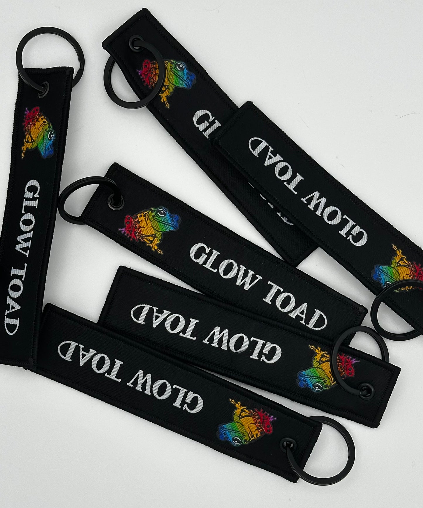 GLOW TOAD FLIGHT TAG KEYCHAIN: CARRY THE GLOW